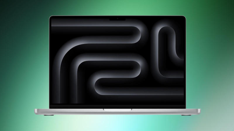 A Macbook Pro on a green background